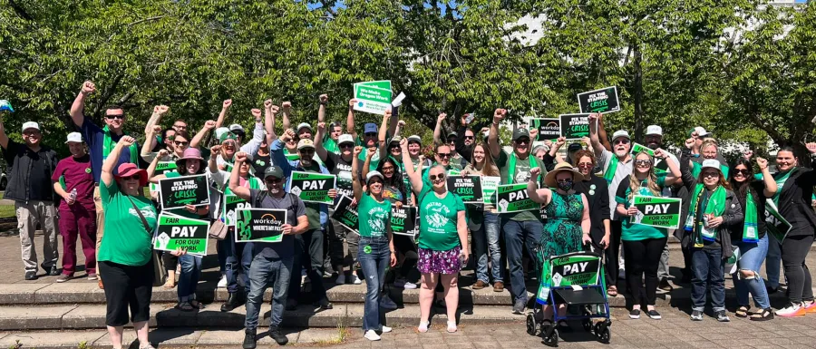 AFSCME members raising fists in solidarity