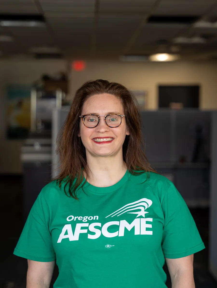 Oregon AFSCME member wearing a green shirt